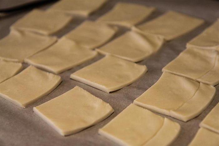 pies with plum in the oven