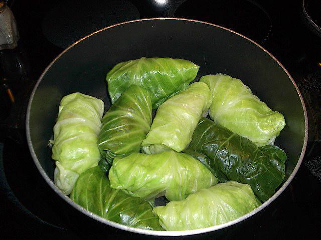 cabbage rolls with rice and mushrooms in a slow cooker