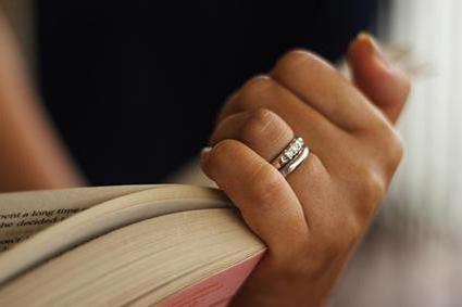 wearing a ring on the ring finger of his left hand